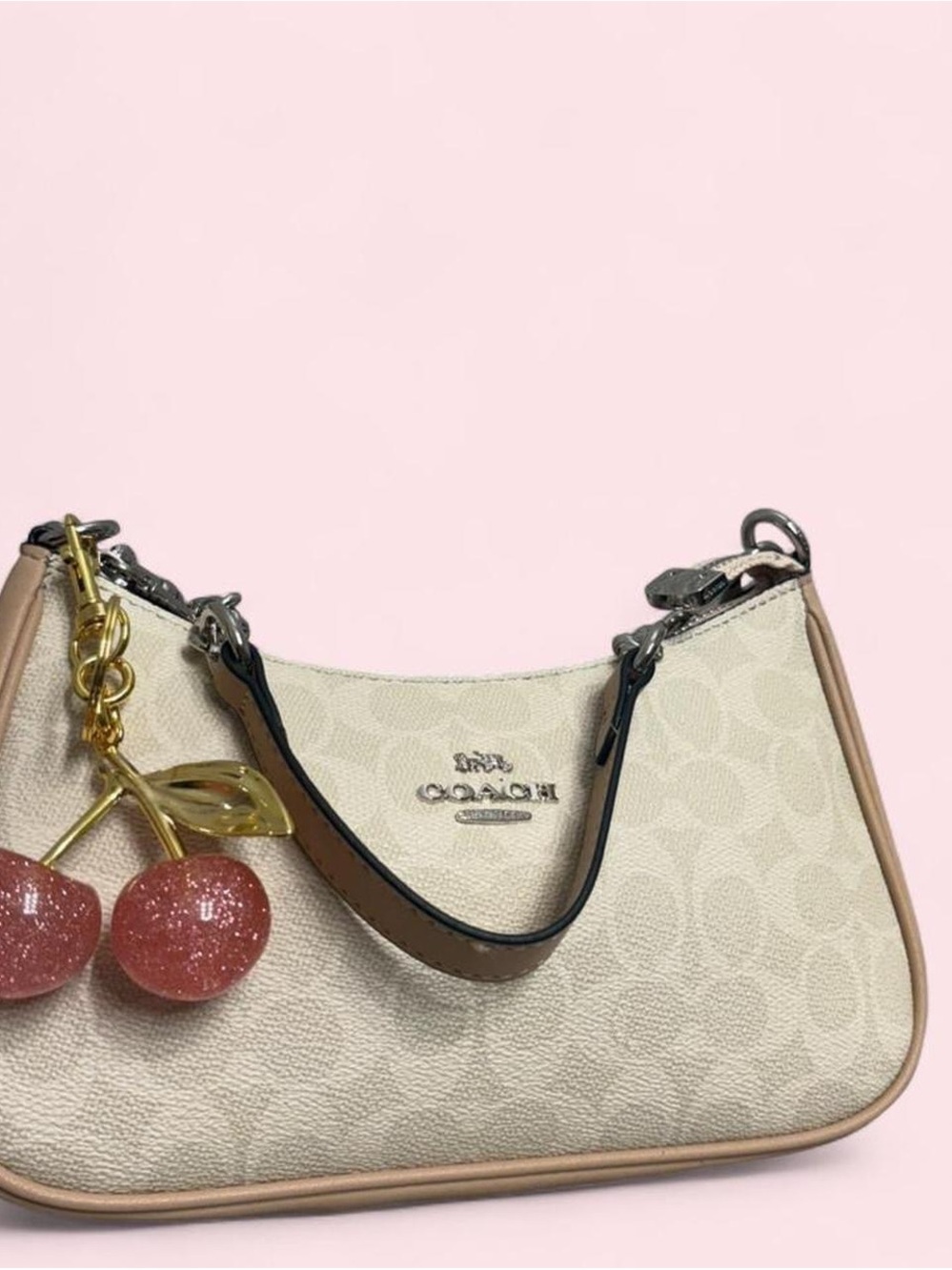 Coach Beige Signature Mini Bag with Pink Cherry Charm